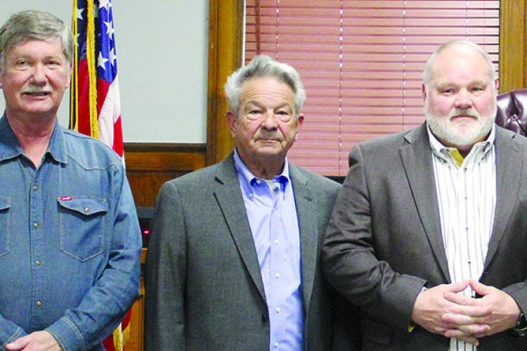 BOBBY DON DAVIES (from left), Max Hockemeier and Bart Willim are sworn into office on Dec. 31, 2024.