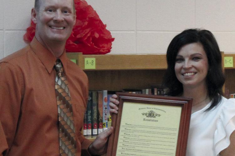 RICHMOND SCHOOL DISTRICT Superintendent Dr. Bryan Copple (left) presents Teacher of Year Nominee Jessica Backs with a proclamation. SHARON DONAT | Staff