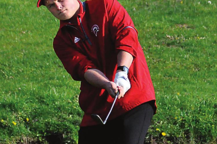 RICHMOND SENIOR Jacob Knutter hits a chip shot on the eighth hole Monday at Shirkey Golf Course. SHAWN RONEY | Staff