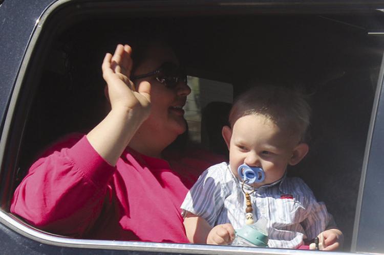 WAYLON BAUGHER takes part in the festivities after being named Tiny Mr. Mushroom King.