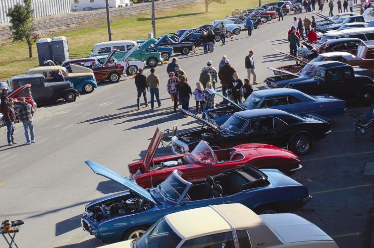 MAIN STREET IN ORRICK comes alive with excitement as crowds gather to admire a stunning display of vintage cars and trucks. SHARON DONAT | Staff