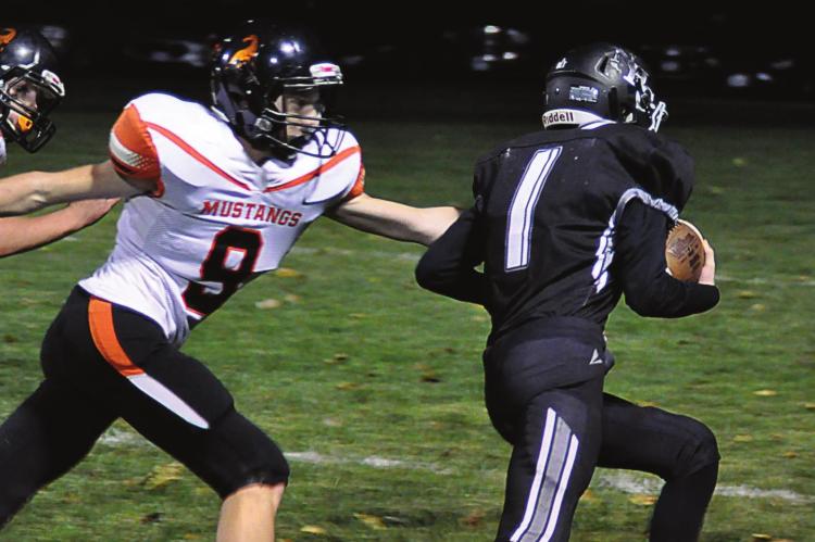 FIRST-YEAR high schooler Kalel Bowman carries the football for Norborne Hardin-Central on Oct. 16 at Hardin-Central. SHAWN RONEY | Staff
