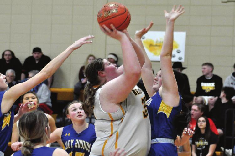 SHAWN RONEY | Richmond News ORRICK JUNIOR Emma Wilson takes a contested shot in the post during the Bearcats’ 40-37 win Tuesday night over visiting Sweet Springs/Malta Bend.