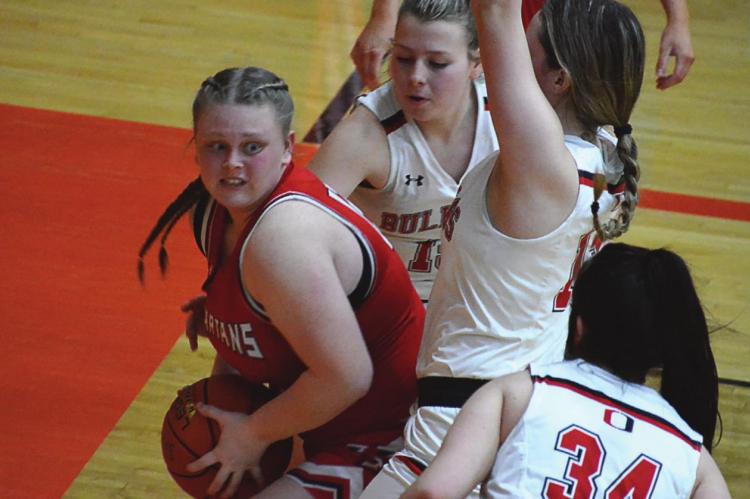 LEXI BOKARAE looks to get out of a baseline trap Monday against Odessa. SHAWN RONEY | Staff