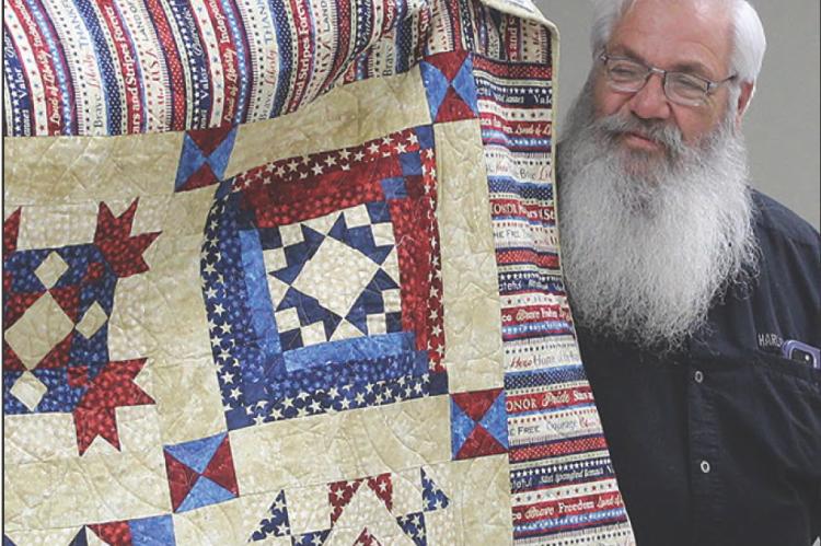 JAMES JONES receives a Quilt of Valor recognizing his U.S. Air Force service from 1976 to 1979, during which he completed training at Chanute Air Force Base before serving at Richards-Gebaur Air Force Base. MIRANDA JAMISON | Staff