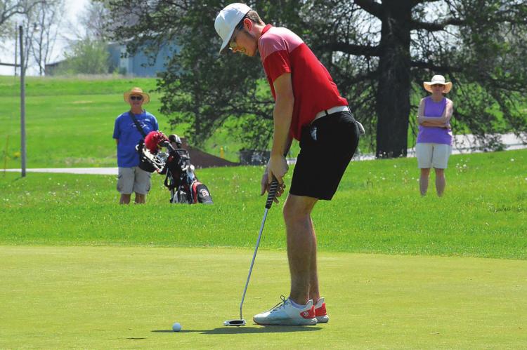 RICHMOND SENIOR Aiden Bowman, headed to state competition for the second straight season, putts Monday afternoon during the Class 2 District 4 Tournament at Shirkey Golf Course. SHAWN RONEY | Staff