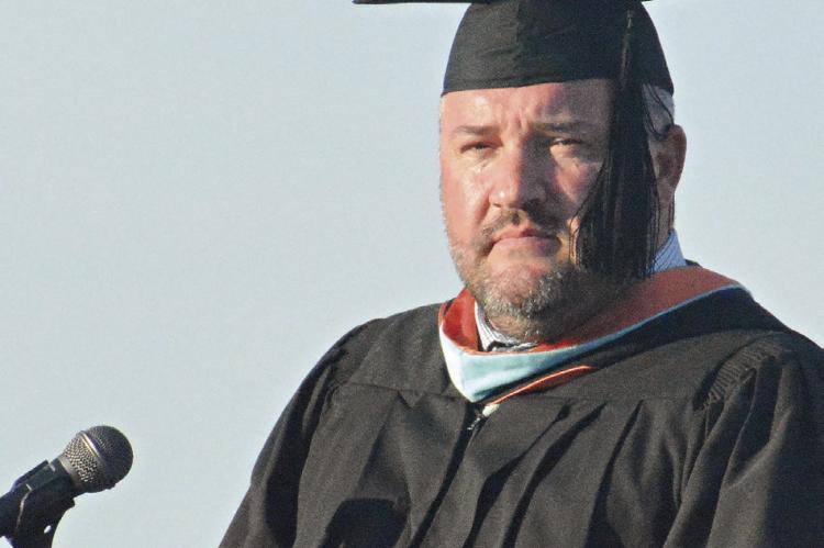 RICHMOND HIGH SCHOOL Principal Brandon Quick presides over the recent commencement ceremony at Spartan Stadium.