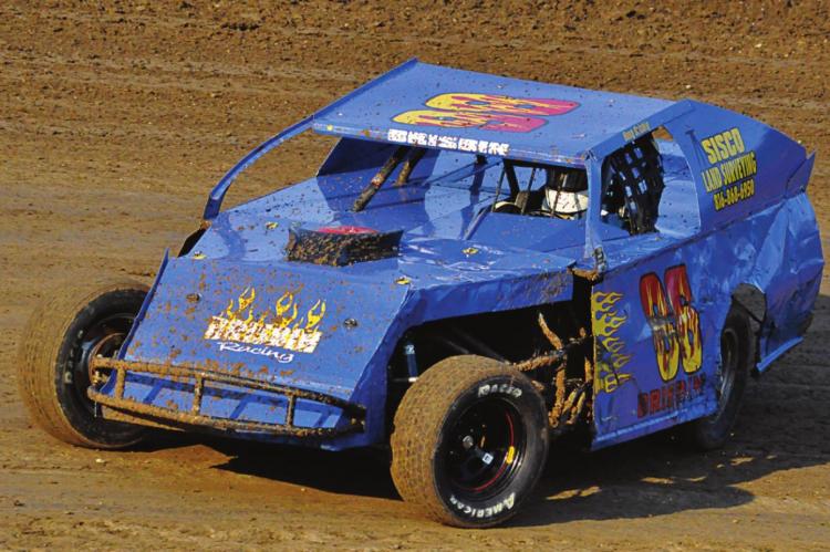 RAY COUNTIAN Doug Brisbin handles a tough corner during his heat race July 3 at Valley Speedway. SHAWN RONEY | Staff