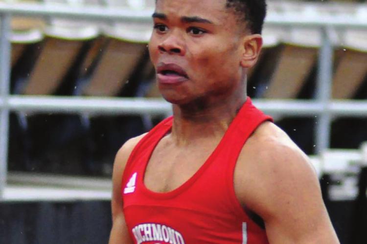 SENIOR ADRIAN CHURCH wins an individual event and helps the Spartans win two relays April 23 at the Mineral Water Classic. SHAWN RONEY | Staff