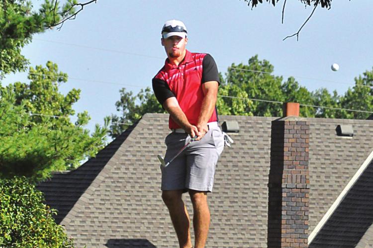 TIMMY HAMILTON of Richmond watches one of his chip shots during his Sept. AJGA qualifying round. SHAWN RONEY | Staff