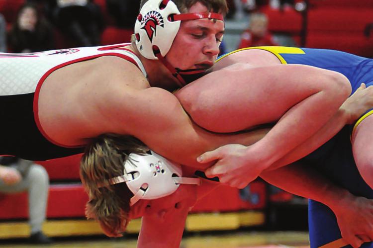 SHAWN RONEY | Staff AIDAN IVISON has the upper hand in his 182-pound match with Ty Ward during Richmond’s dual with St. Pius X of Kansas City on Jan. 13 at Richmond High School.