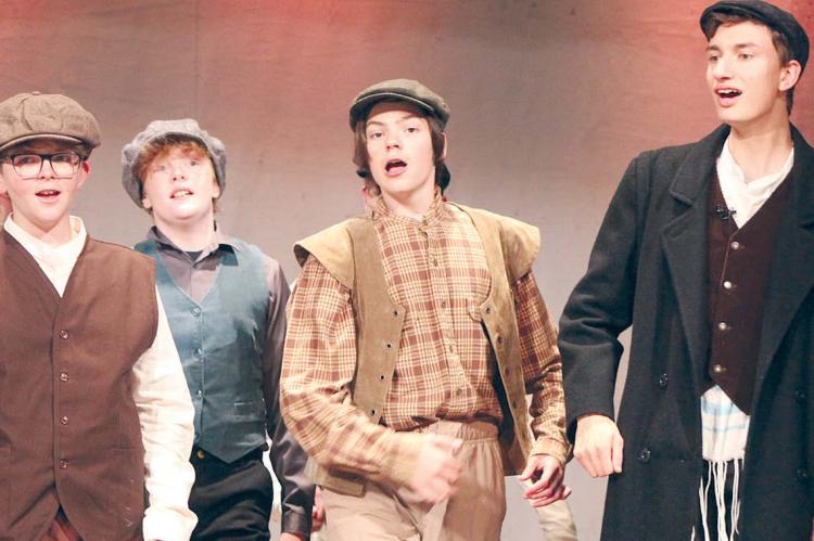 RYKER KUGLER (from left), Jackson Crowley, Elijah Durham, Max Engler and Sara Sidel rehearse a musical number as the cast prepares for Fiddler on the Roof at the Farris Theatre. SHARON DONAT | Staff