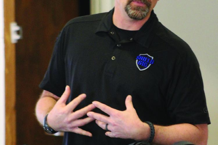 SHIELD 616 Founder Jake Stifskad introduces himself and the charity program for law enforcement. SOPHIA BALES | Staff