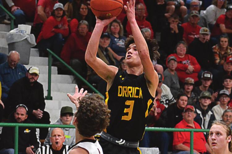 JUNIOR ZANDER STEVINSON attempts a fourth-quarter jump shot for the Bearcats on Feb. 25 in the Class 1 District 13 Tournament title game. SHAWN RONEY | Staff
