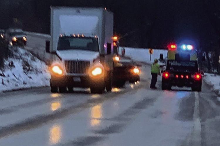 SLICK ROADS Tuesday kept tow truck drivers busy on Hwy 10. There seems to be some reprieve on the horizon, as warmer temperatures and less precipitation are expected next week. KRISTY DILLMAN | Submitted