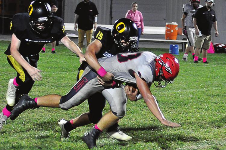 ORRICK freshman Jaxon Miller tackles Santa Fe running back Carter Woodrich to help the Bearcats win. SHAWN RONEY | Staff