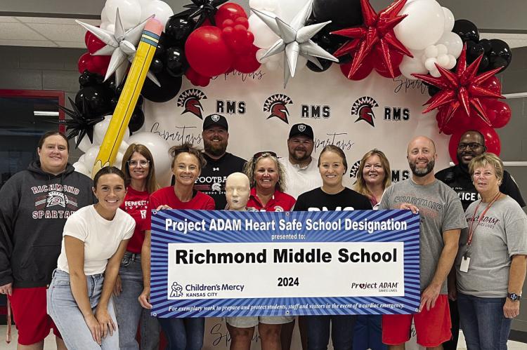 RMS STAFF celebrates receiving Project ADAM Heart Safe school designation. Submitted
