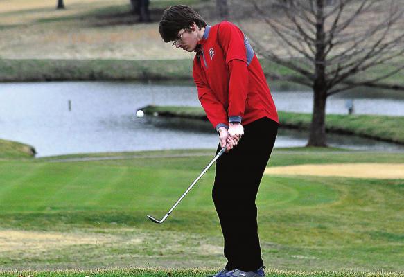 RICHMOND JUNIOR Aiden Bowman, one of seven returning boys golfers for the Spartans, practices his chip shot March 16 at Shirkey Golf Course. SHAWN RONEY | Staff