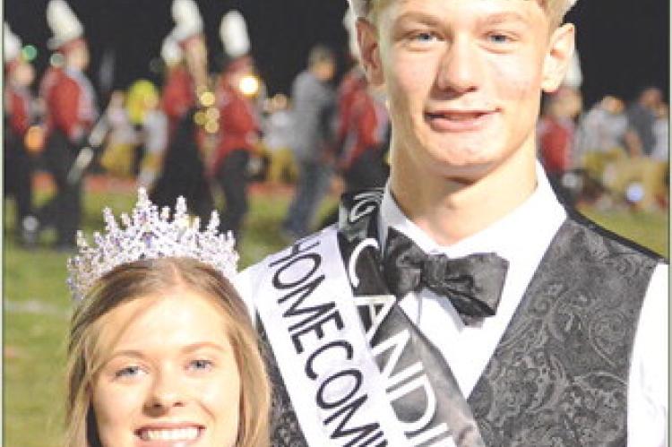 GRACE BOZARTH (left) and Gabe Baker were crowned Richmond High School’s Homecoming King and Queen during half- time festivities Sept. 22 at Spartan Stadium. SHAWN RONEY | Staff