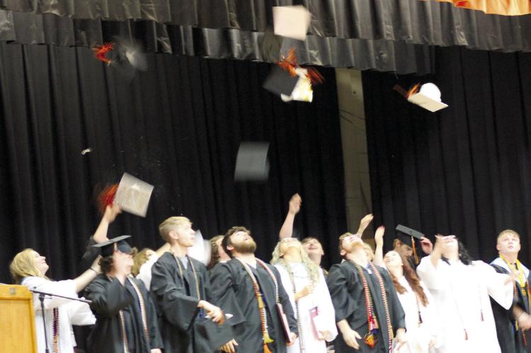 H-C SENIORS throw their graduation caps sky high – like their potential – ready for their futures. SOPHIA BALES | Staff