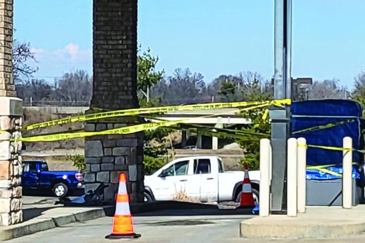 RICHMOND COMMUNITY BANK of Missouri ATM area is taped off with yellow police tape. SHARON DONAT | Staff