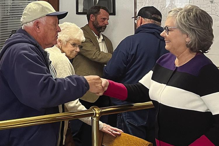 DISTRICT 7 STATE Representative Peggy McGaugh (right) meets with Hardin residents about State Hwy A at last week’s Ray County Commissioners meeting. SOPHIA BALES | Staff