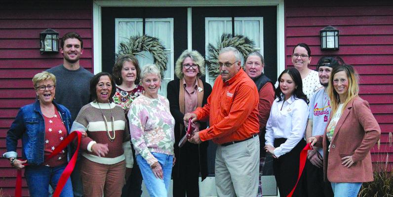 RICHMOND AREA CHAMBER of Commerce members join Red Barn Farm staff for a ribbon-cutting event in celebration of the business opening. SHARON DONAT | Staff