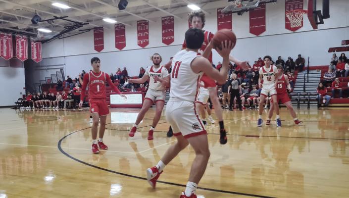 SENIOR DAYNE LOFTIN looks to pass.