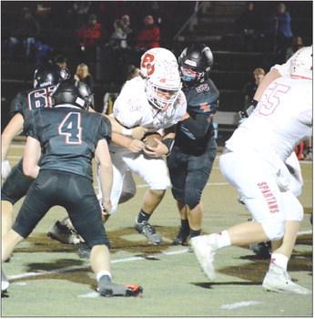 RICHMOND SOPHOMORE Dayton Bushong, No. 44, rumbles through a hole in the line during the second half of the Spartans’ 48-0 Oct. 14 road rout of Knob Noster in Missouri River Valley Conference East Division action. SHAWN RONEY | Staff