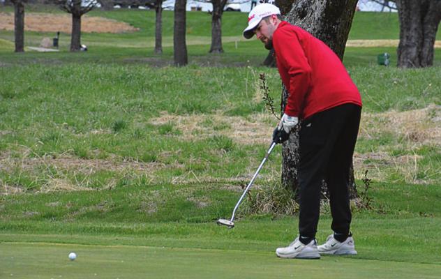 RICHMOND SENIOR Collin Cromley putts on a chilly Tuesday afternoon. SHAWN RONEY | Staff
