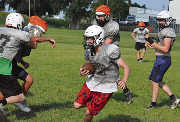 KALEL BOWMAN, shown carrying the football during a recent practice at Hardin-Central, wants to avenge the Aggies’ losses to Sweet Springs. SHAWN RONEY | Staff