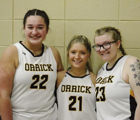 ORRICK ALSO honors its three girls basketball seniors between Tuesday’s varsity games with Concordia. After the ceremony, they take time for a group photo. From left are Madalyn Norton, Kirra Vaughn and Kaitlin Leader. SHAWN RONEY | Staff