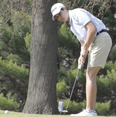 MATTOX McCLOUD, shown attempting a putt during practice, is among four returning varsity players that Richmond boys golf coach Brandon Rittmiller expects to help lead the program this spring. SHAWN RONEY | Staff