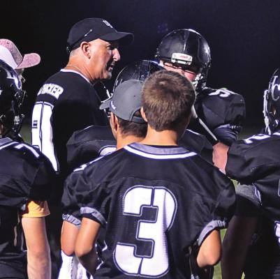 RICHMOND HIGH SCHOOL graduate Kirk Thacker, seen here in 2020 in a crowd of his Norborne Hardin-Central varsity 8-man football players, has taken the helm of Orrick’s varsity 8-man program. SHAWN RONEY | Staff