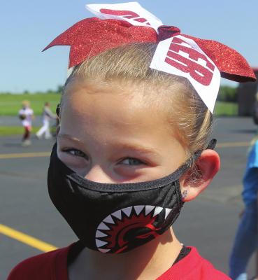 ON THE PLAYGROUND at Sunrise Elementary School, third-grader Ariel Lee wears a safety mask. J.C. VENTIMIGLIA | Staff