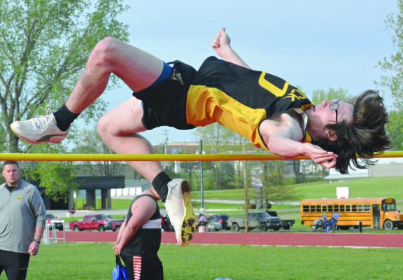 ORRICK SENIOR Jonathon Harris attempts to clear the bar during the boys high jump April 19 at the Bruce Finlayson Invitational at Carrollton. SHAWN RONEY | Staff