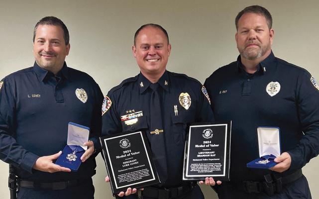 RICHMOND POLICE DEPARTMENT Sgt. Luke Covey (from left), Chief Scott Bagley and Lt. Brandon Ray celebrate receiving the Medal of Valor. Submitted