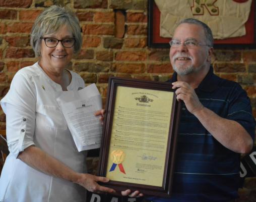 STATE REP. Peggy McGuagh presents Jack “Miles” Ventimiglia with a resolution from the Missouri House of Representatives commending Ventimiglia for his decades of service as a journalist, including with the Richmond News and Excelsior Springs Standard. A retirement party is held for Ventimiglia June 16 at Hometown Pizza in Richmond. SHAWN RONEY | Staff