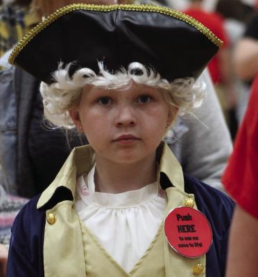 KORI FORBIS plays George Washington as a wax figurine.