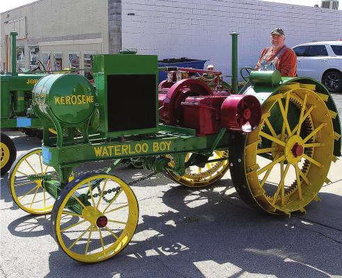 IN THE DRIVER’S SEAT, Scott Homfeld, Lexington, shows off his 1919 Waterloo Boy Model N tractor Saturday at the Richmond Mushroom Festival. J.C. VENTIMIGLIA | Staff