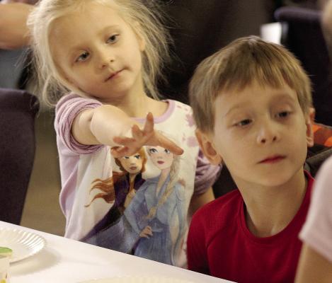 ANN (LEFT) and Jack Covey participate in the Special Needs Services of Ray County cookie decorating event. Read story on page 4. SOPHIA BALES | Staff