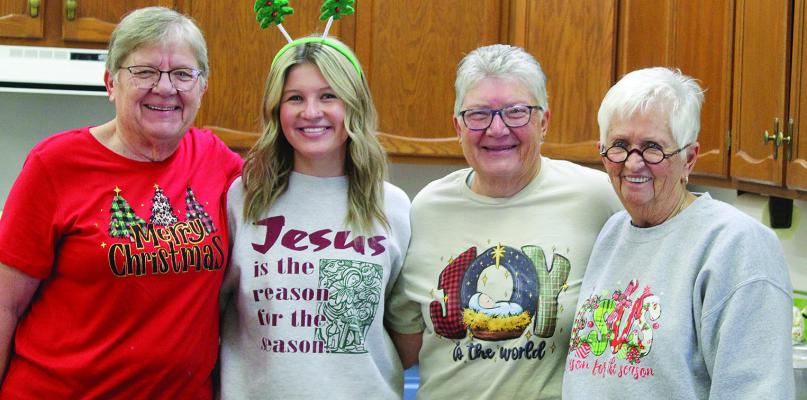 PAULA JOHNSON (from left), Sundi Swafford, Becki Crowley and Dixie Swafford prepare goodies for shoppers at the event, hosted by Rayville Christian Union Church. SHARON DONAT | Staff