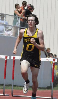 JONATHON HARRIS leads the way in the varsity boys 300-meter intermediate hurdles during the Norborne Pirate Invitational April 14 at Spartan Stadium. SHAWN RONEY | Staff