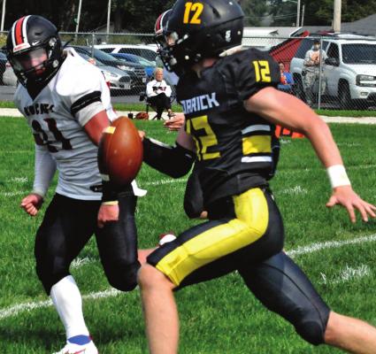 ORRICK QUARTERBACK Blake Buchanan scrambles for yards Sept. 19 against visiting Braymer/Breckenridge. SHAWN RONEY | Staff