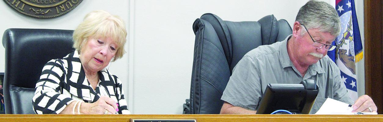 RAY COUNTY COMMISSIONERS respond to questions concerning the accuracy of meeting minutes. MIRANDA JAMISON | Staff