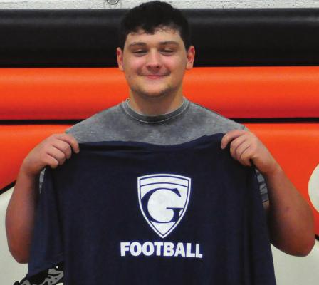 KYSOR HUGHES proudly displays his Graceland University T-shirt. SHAWN RONEY | Staff