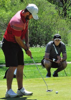 RICHMOND SENIOR Timmy Hamilton putts on the 18th green April 30 at Shirkey Golf Course in tournament play. SHAWN RONEY | Staff