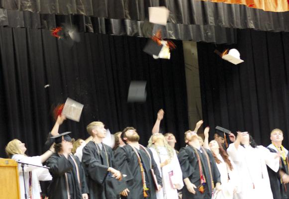 H-C SENIORS throw their graduation caps sky high – like their potential – ready for their futures. SOPHIA BALES | Staff