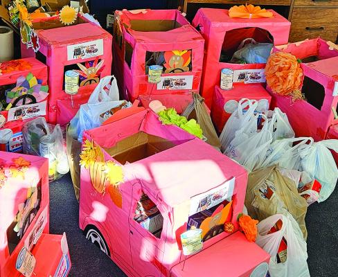 STUFFED RED TRUCK turkey boxes fill the Richmond News lobby before being delivered to the Richmond United Methodist Food Pantry. MIRANDA JAMISON | Staff