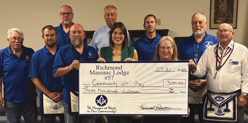 MEMBERS OF MASONIC LODGE #57 present a $300 donation to Special Needs Services of Ray County (SNS). The contribution supported SNS’s Community at Play hygiene drive, which aims to reduce bullying in schools by providing hygiene kits to students. The donation helped SNS surpass its goal, distributing 375 kits at the Back-to-School Supply Fair. Submitted